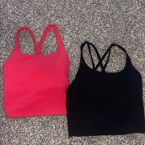 2 pack of Athletic Pink and Black Strappy Crop Tops. Price is for both tops